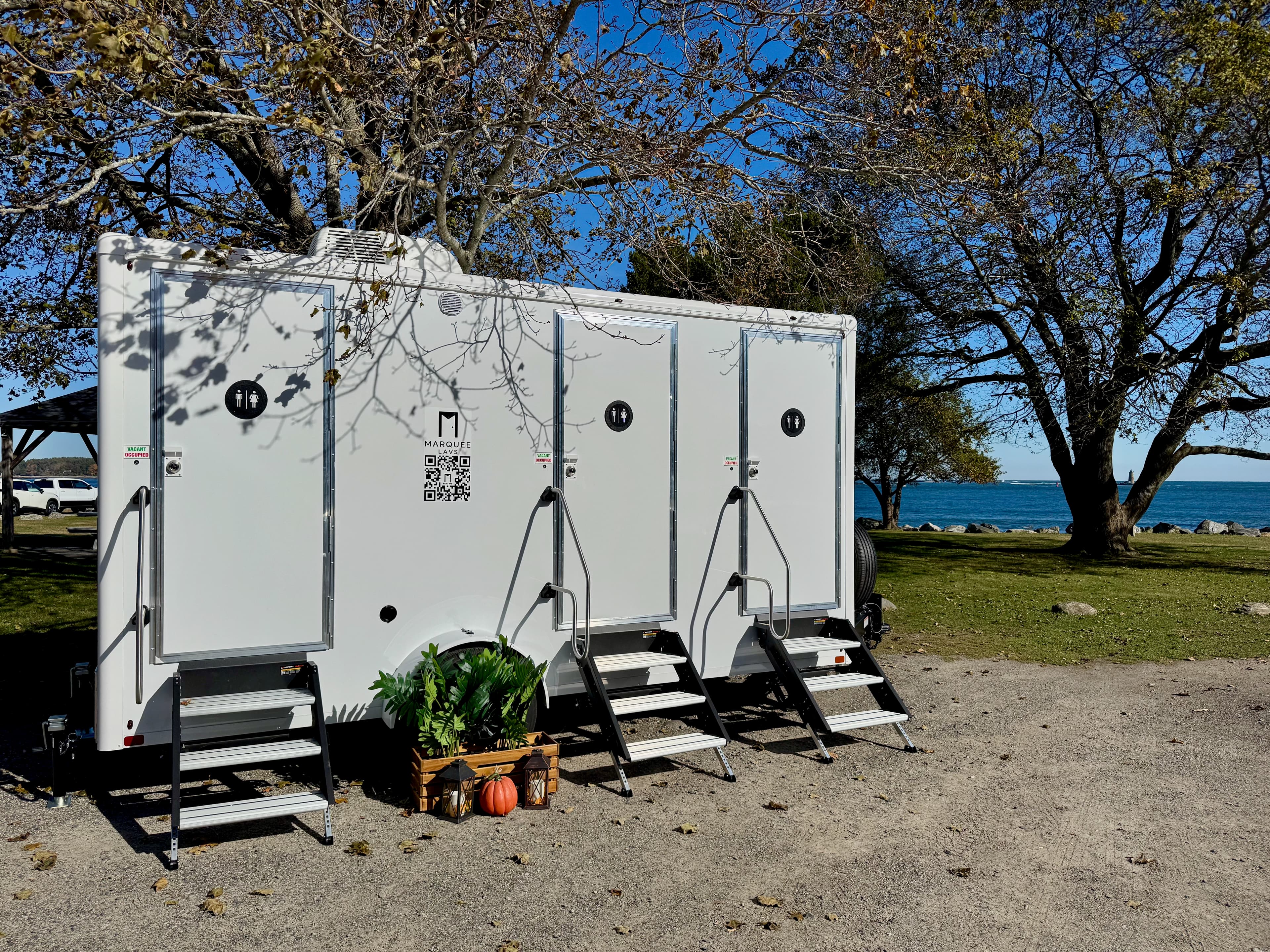 Marquee luxury restroom trailer at an event